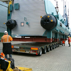 Direct receipt ex vessel’s hold, onto multi axle low-loader for inland transport.